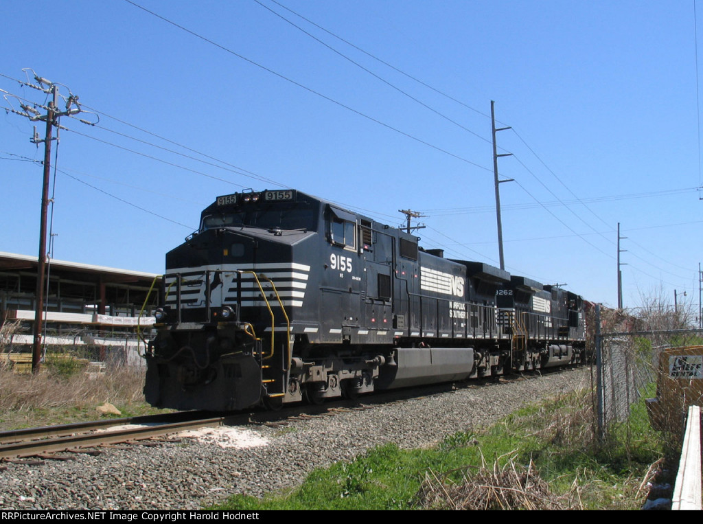 NS 9155 leads train 349, held at Raleigh Blvd.